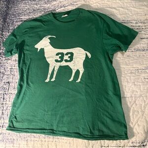 Green T-Shirt with White Goat Print. Larry Bird